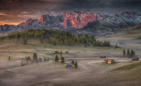 Burning mountain over the frozen valley