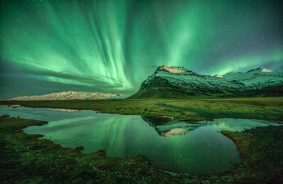 As the night lights lit the land up