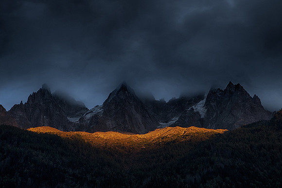 Gold spilled below the peaks